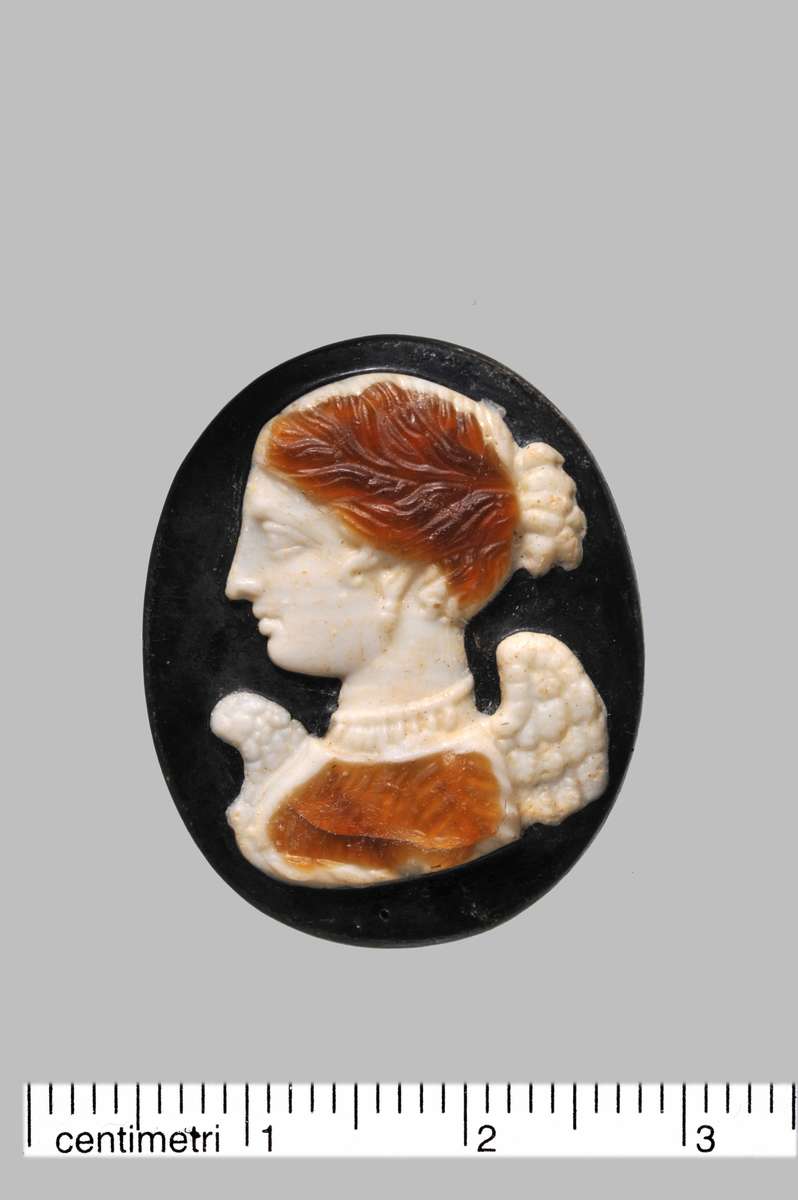 Glass paste cameo of Nike (Victory). Lent by the Museo Archeologico Nazionale di Napoli.