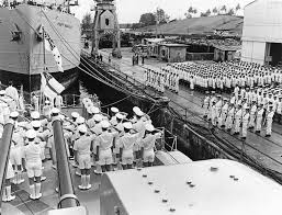 Lowering the British White Ensign and raising the Australian White Ensign, HMAS <em>Vampire</em>, Singapore, 1 March 1967 Courtesy RAN. Image: Sea Power Centre.