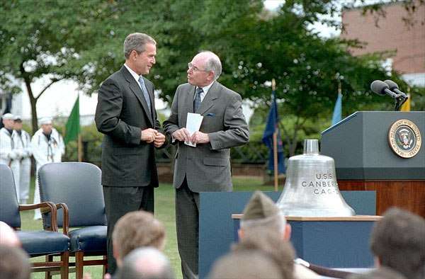 President George W Bush presented the USS Canberra bell to Australian Prime Minister John Howard at Washington Navy Yard on 10 September 2001 to commemorate 50 years of the ANZUS military alliance. Image: White House photo by Tina Hager.