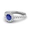 Sapphire Engagement Ring 5mm Round Blue Sapphire in White Gold with White Cluster Stones