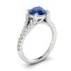 An exquisite sapphire engagement ring with 26 white cubic zirconia accent stones.