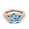 Magnificent natural aquamarine centre stone in a spectacular round cut setting.