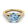 Yellow gold engagement ring with a four-pronged natural round cut 6mm aquamarine centre stone.