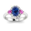 Diamond Accented Three Stone Sapphire Engagement Ring in 18k White Gold Setting