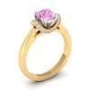 Side angle of Passiflora two tone gold engagement ring with pink Ceylon sapphire