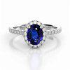 Blue sapphire oval halo engagement ring from Brilliyond