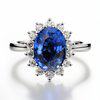 Blue Sapphire engagement ring reminiscent of the Princess Diana and Princess Kate's ring