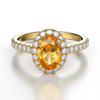 Yellow sapphire oval halo engagement ring from Brilliyond