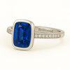Brilliyond Jewellery white gold ring with rectangular blue sapphire center, cushion cut, and diamond accents.
