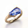 Blue sapphire engagement with distinct yellow gold metal band