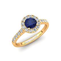 5mm Blue Sapphire Halo Engagement Ring in Yellow Gold with white cluster stones
