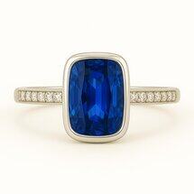 Brilliyond Jewellery white gold ring with rectangular blue sapphire center and diamond accents, Celestia Blue.