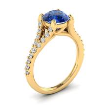 A delicate pavé split shank set white created diamonds embellished this 18k yellow gold ring.
