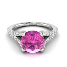 Unique four-pronged white gold engagement ring with 26 cubic zirconia in a  pavé split shank setting.