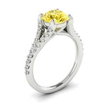 Juliana engagement ring featuring a 6mm round cut yellow Ceylon sapphire in four prongs.