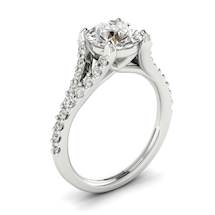 A white gold engagement ring like no other featuring 26 white created diamond accent stones in a pavé split shank setting.