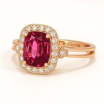 18K rose gold split band ring with oval ruby center, diamond halo, angled side view – Rosalynne Design