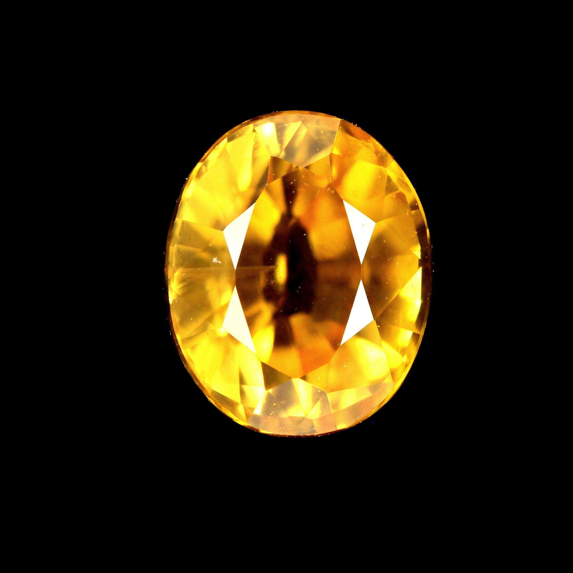 Yellow sapphire 0.86ct  Colour:  Colour Variety: Golden Yellow  Size: 5.74X4.76X3.58  Shape: Oval Shape