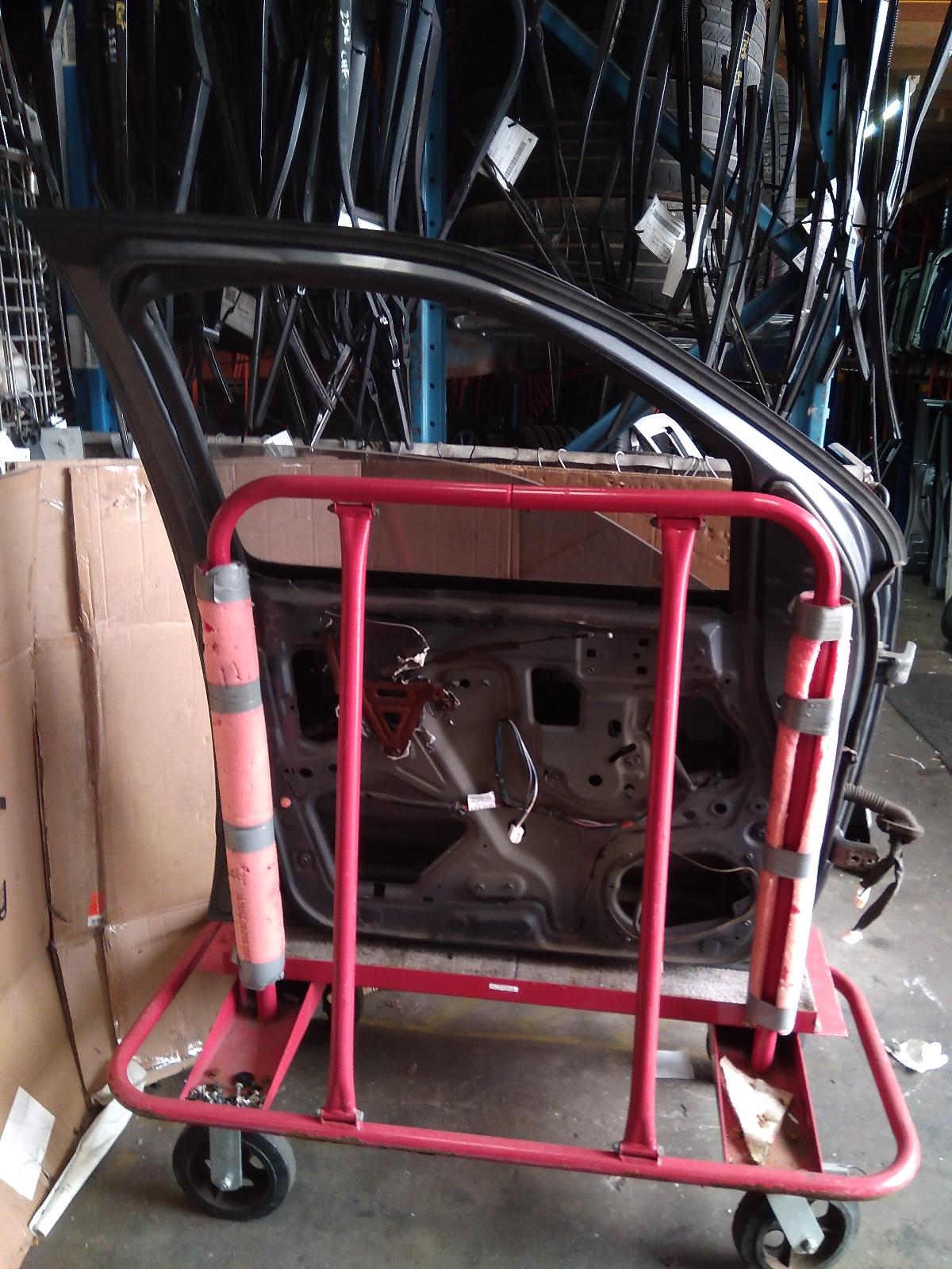 View Auto part Left Front Door Nissan Navara 2009