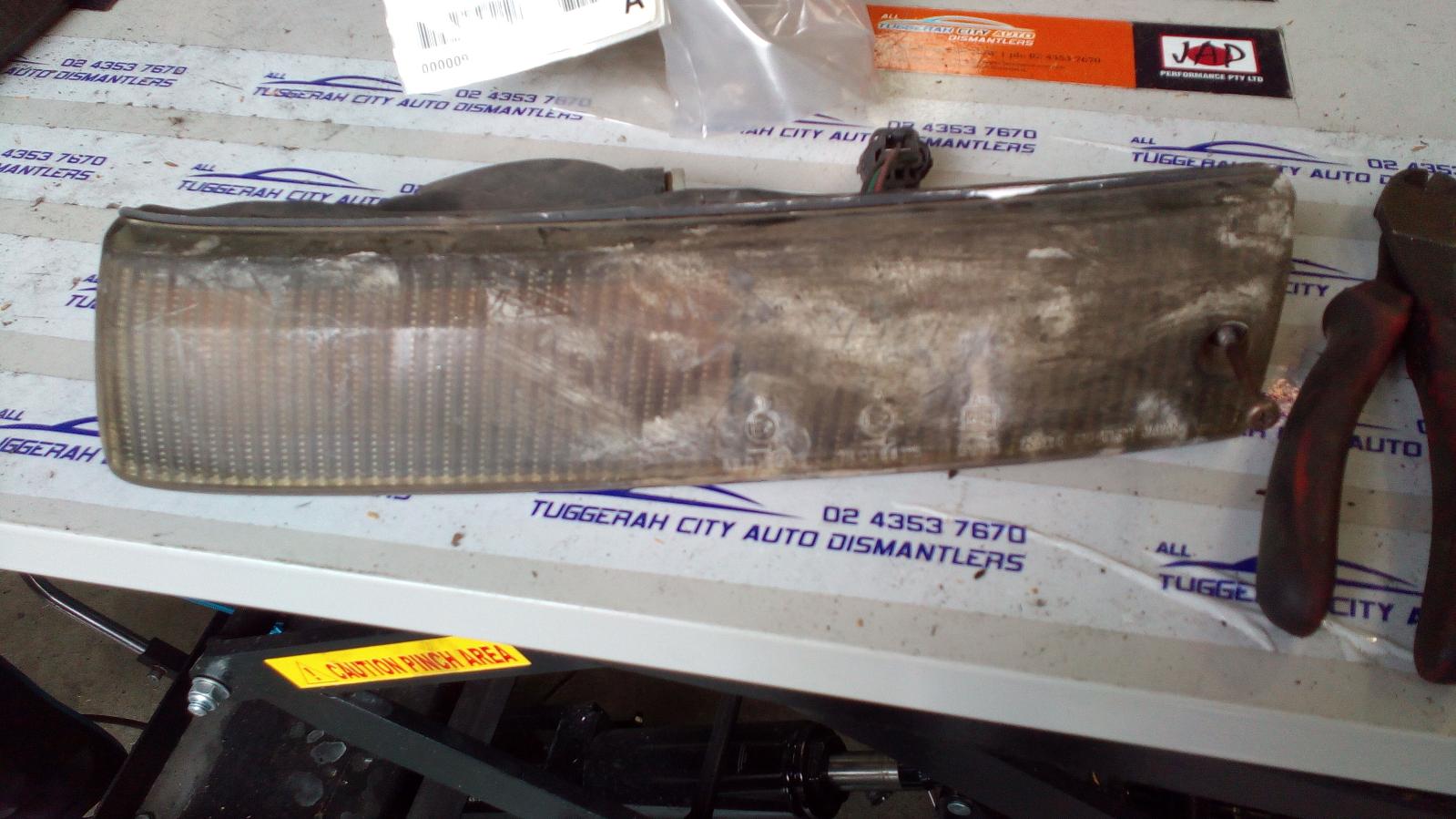 1993 Mazda Astina Left Indicator/Fog/Side View Auto part Left Indicator/Fog/Side Mazda Astina 1993