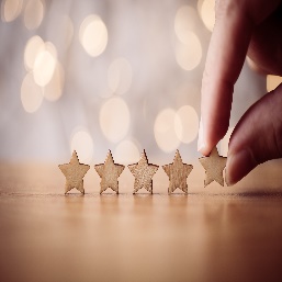 Hand and five stars
