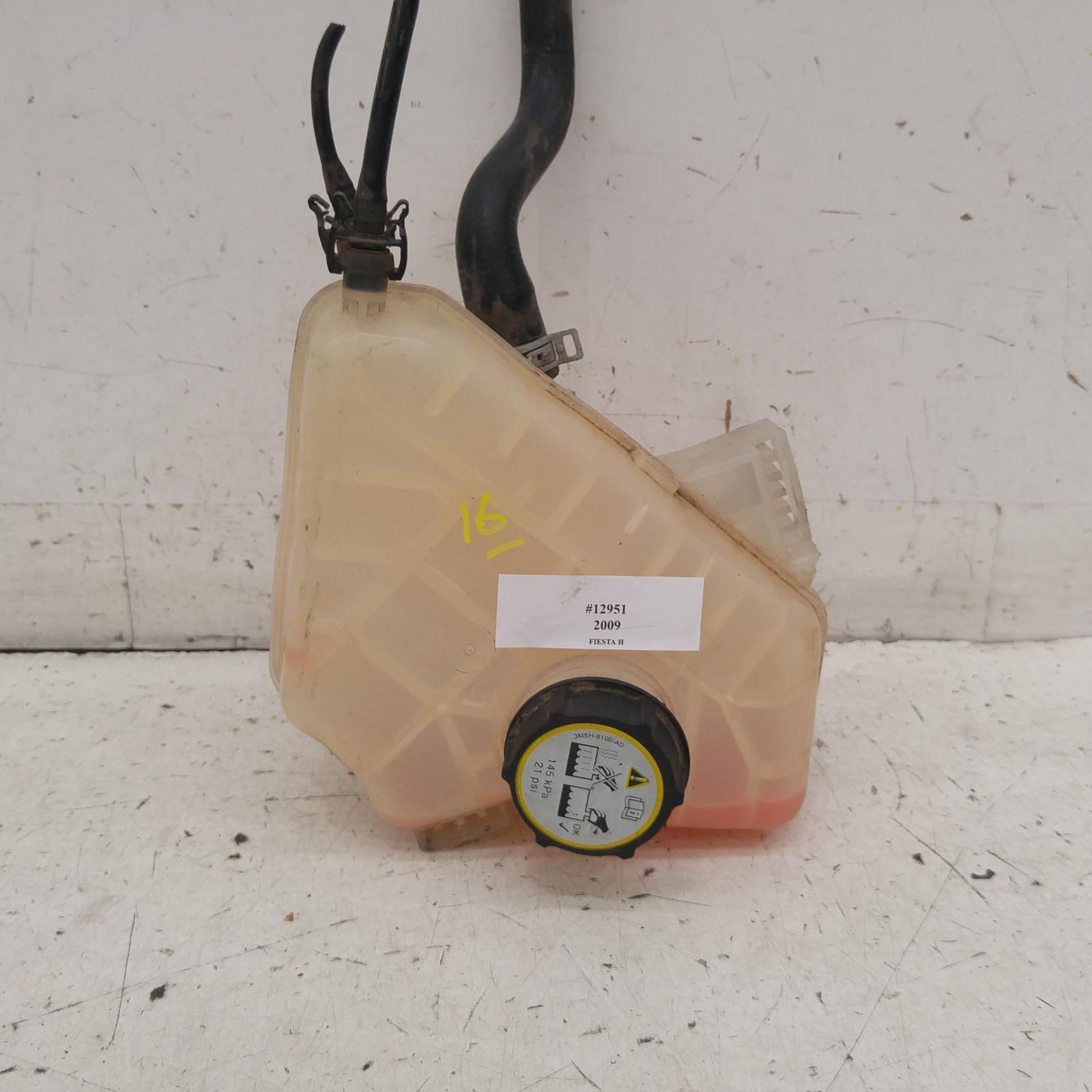 View Auto part Overflow Bottle Ford Fiesta 2009