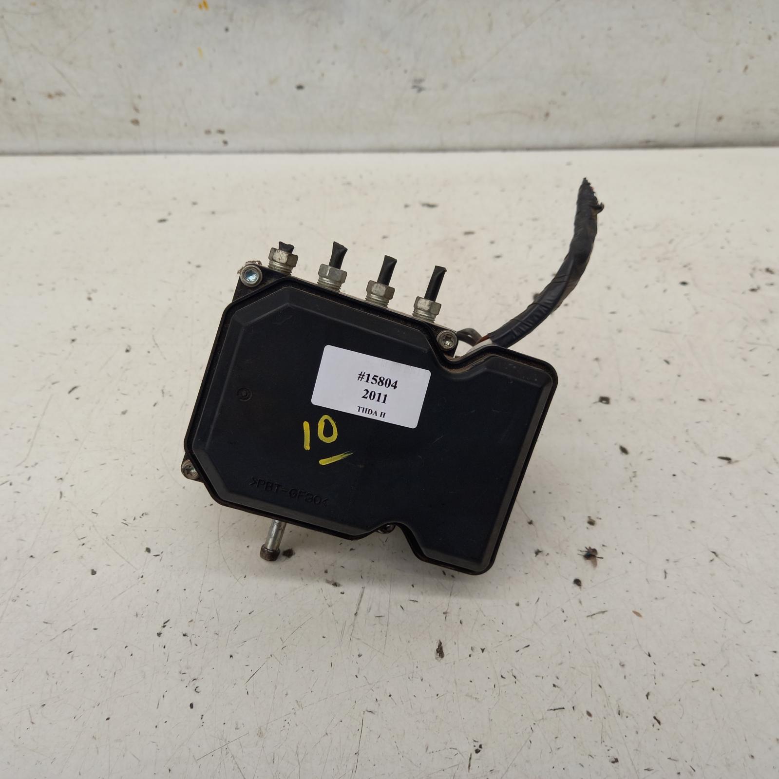 2011 Nissan Tiida Abs Pump/Modulator View Auto part Abs Pump/Modulator Nissan Tiida 2011