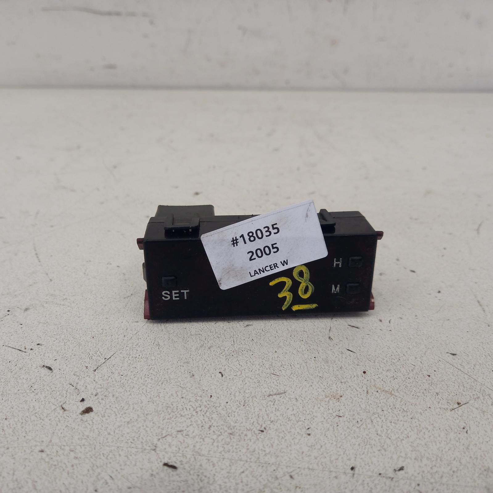 2005 Mitsubishi Lancer Clock View Auto part Clock Mitsubishi Lancer 2005