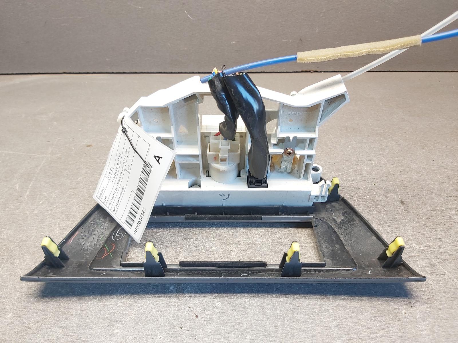 2004 Mitsubishi Lancer Heater/Ac Controls View Auto part Heater/Ac Controls Mitsubishi Lancer 2004