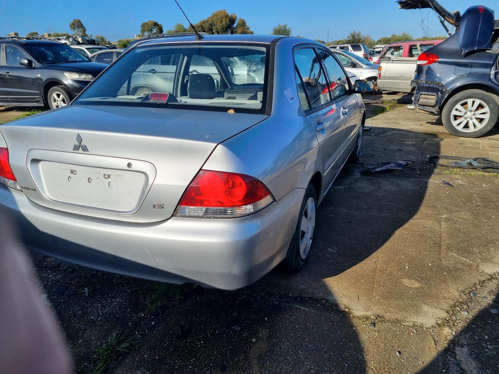 2004 Mitsubishi Lancer Heater/Ac Controls View Auto part Heater/Ac Controls Mitsubishi Lancer 2004