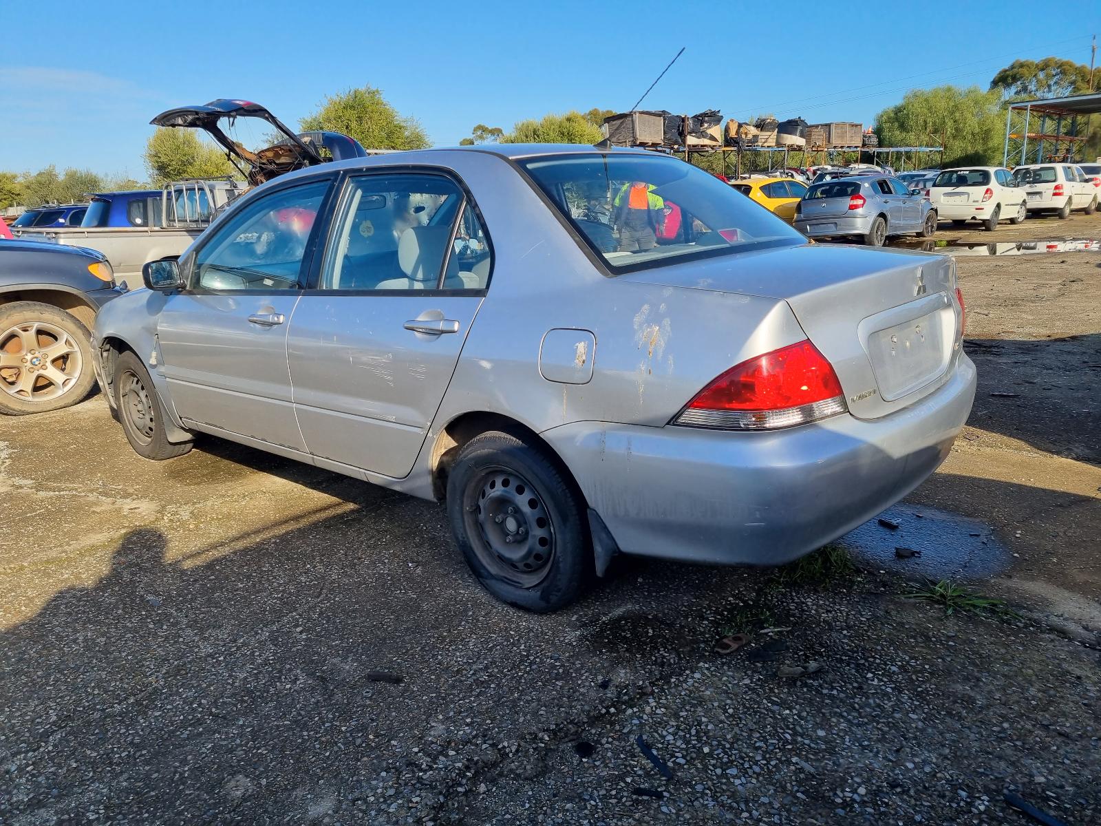 2004 Mitsubishi Lancer Heater/Ac Controls View Auto part Heater/Ac Controls Mitsubishi Lancer 2004