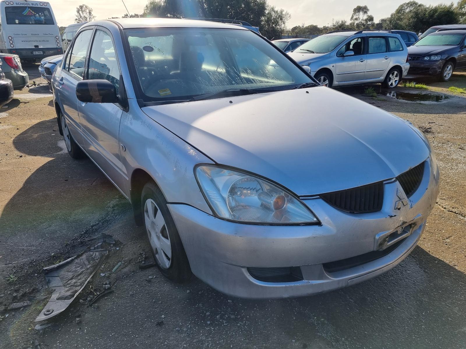 2004 Mitsubishi Lancer Heater/Ac Controls View Auto part Heater/Ac Controls Mitsubishi Lancer 2004