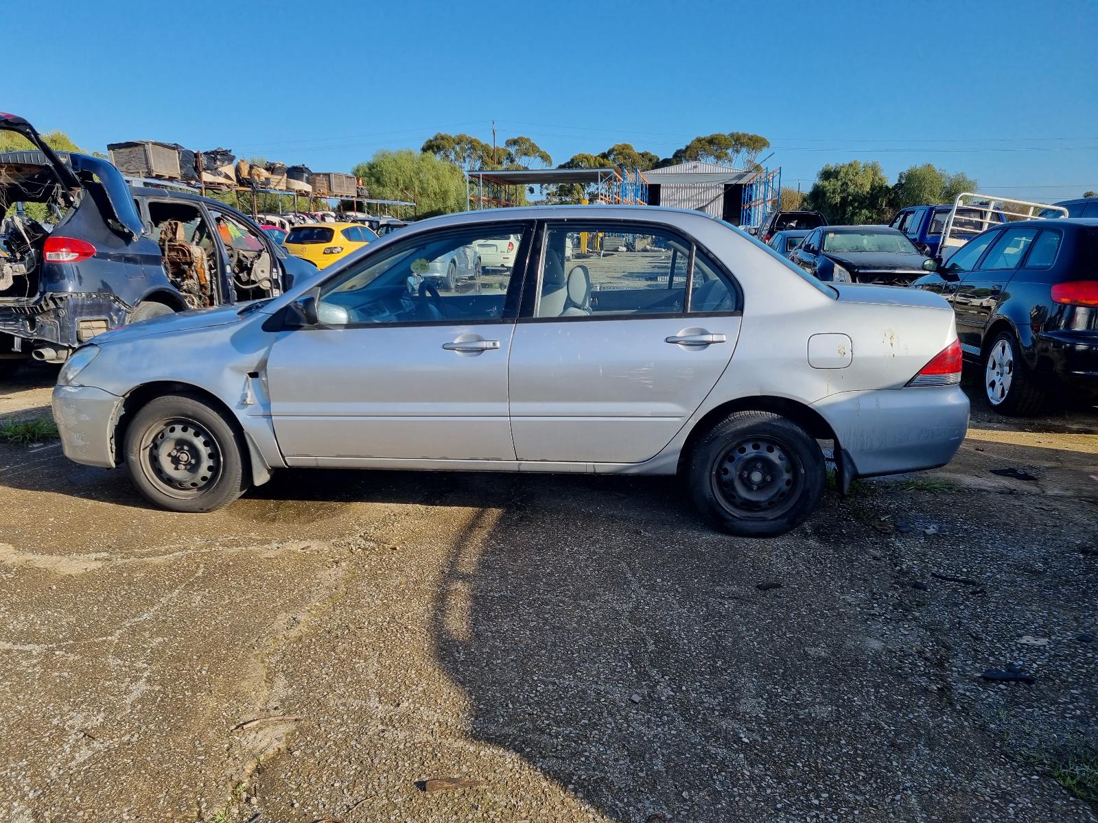 2004 Mitsubishi Lancer Heater/Ac Controls View Auto part Heater/Ac Controls Mitsubishi Lancer 2004