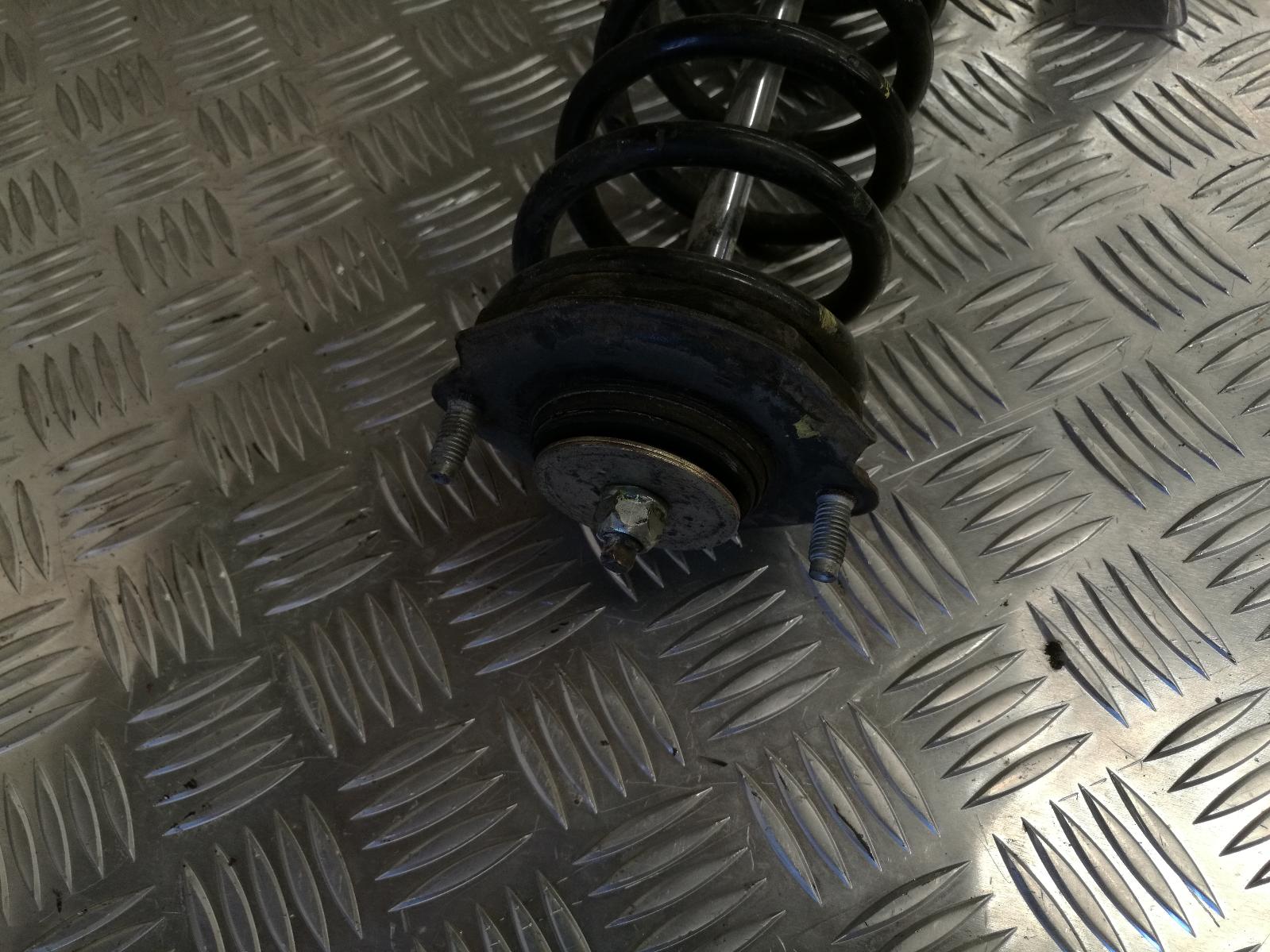 Left Rear Strut Starlet Toyota 1997