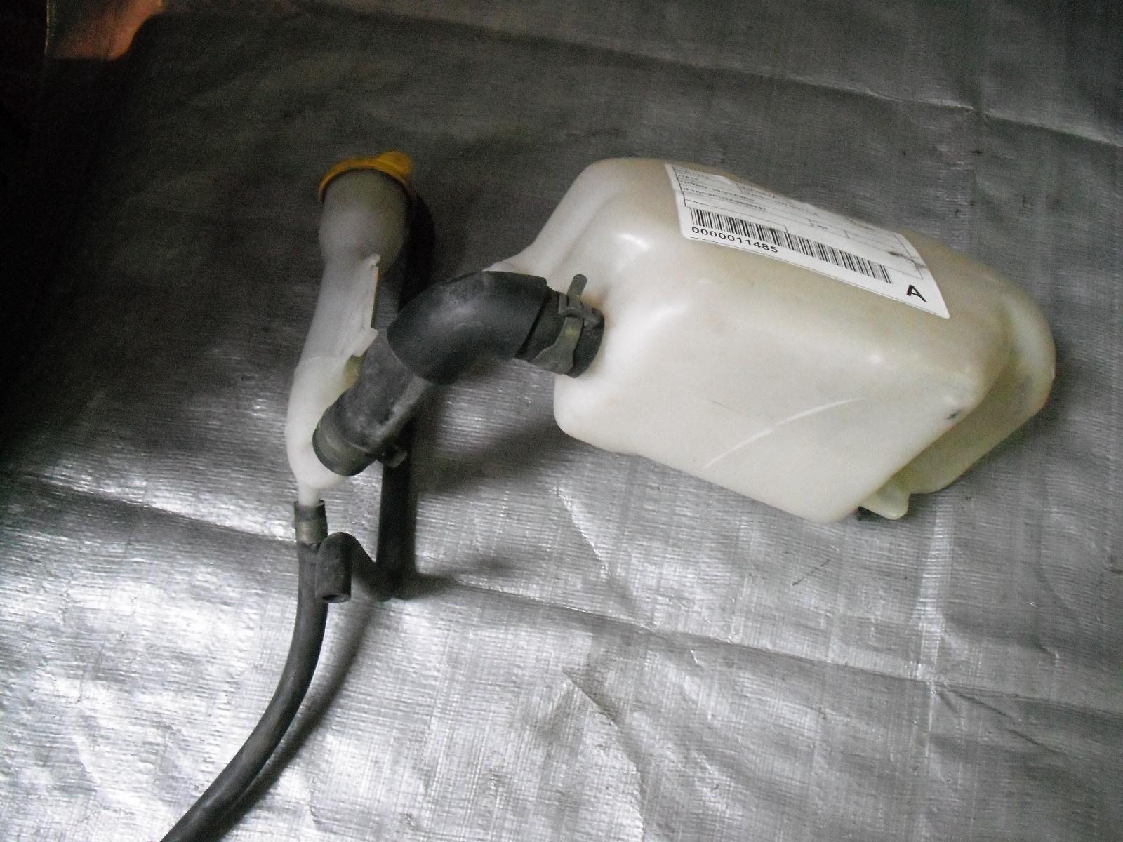 View Auto part Overflow Bottle Subaru Impreza 1999