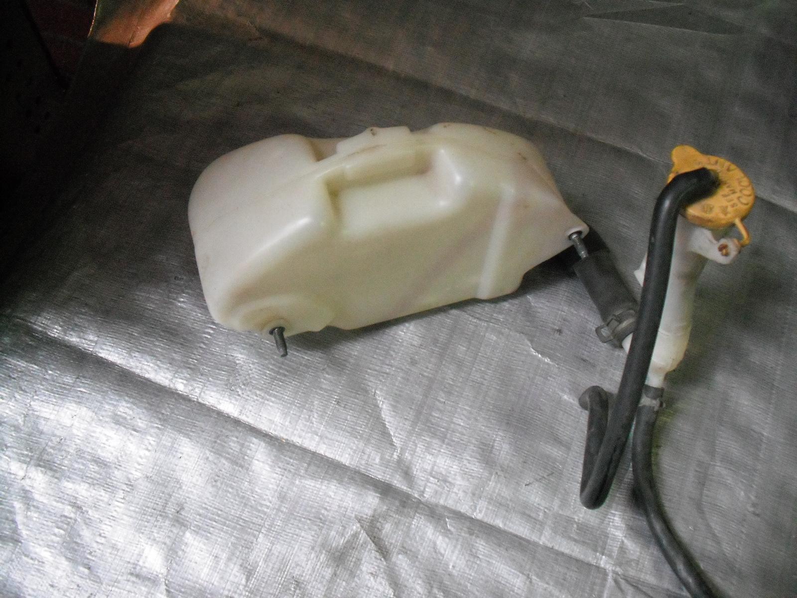 View Auto part Overflow Bottle Subaru Impreza 1999