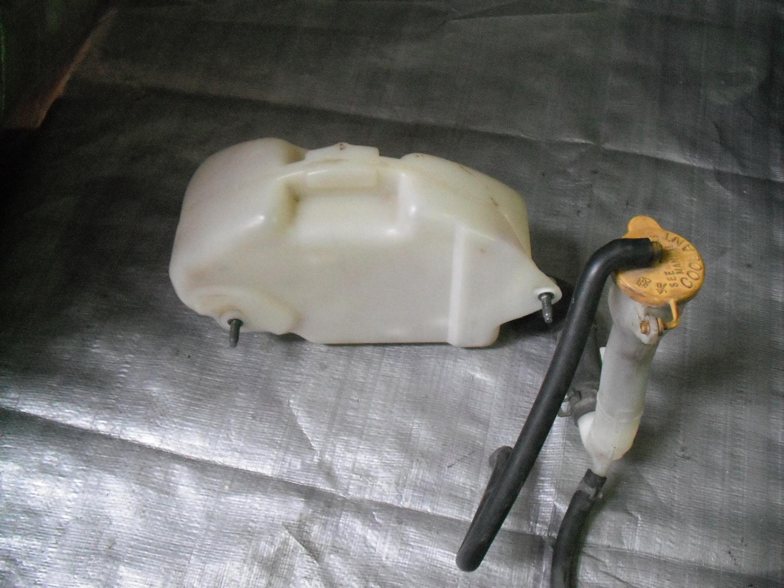 View Auto part Overflow Bottle Subaru Impreza 1999