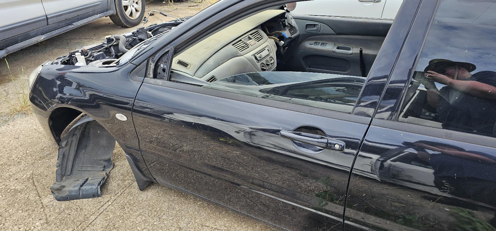 2005 Mitsubishi Lancer Antenna View Auto part Antenna Mitsubishi Lancer 2005