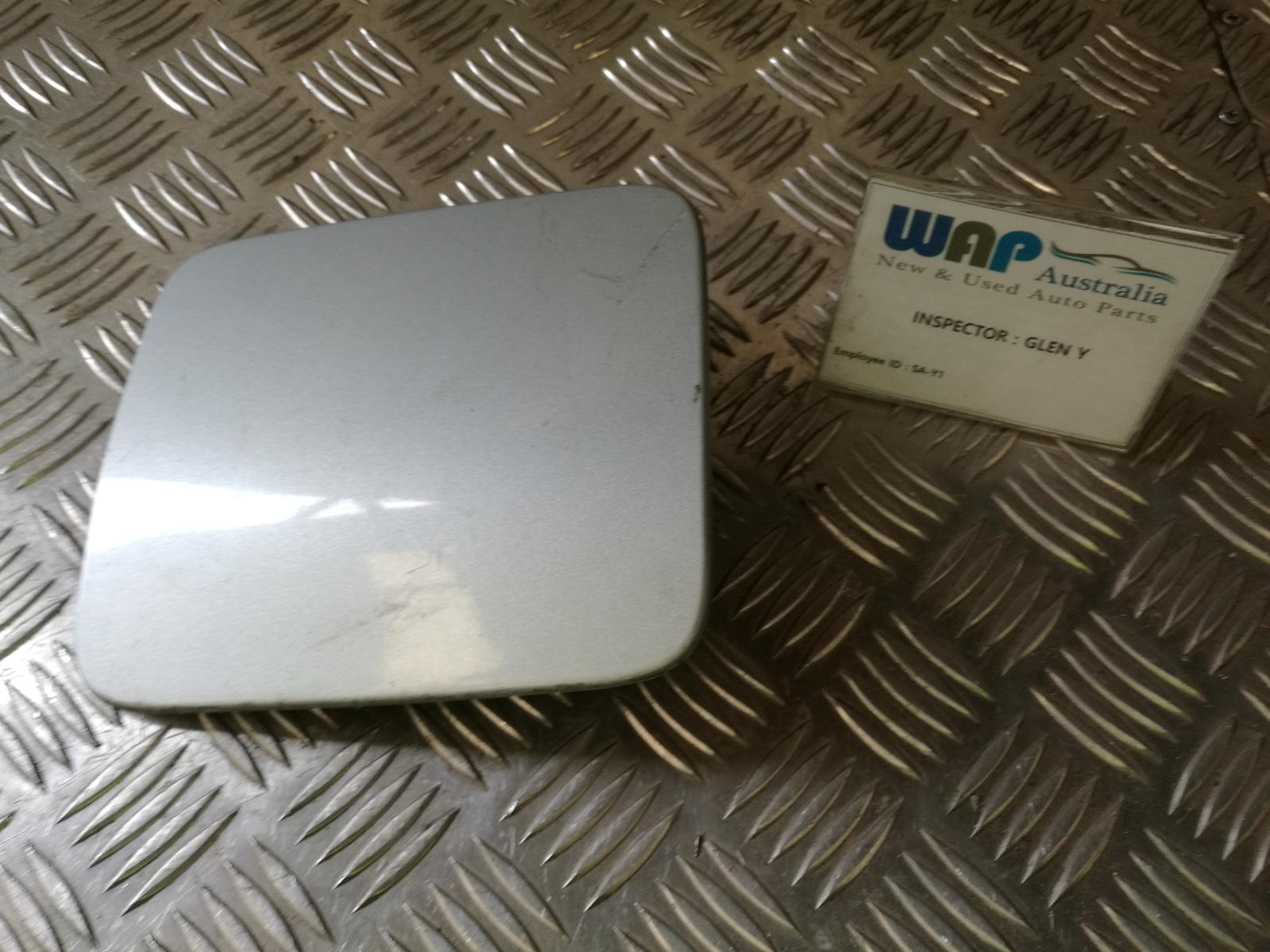 2004 Mitsubishi Magna Fuel Door / Filler View Auto part Fuel Door / Filler Mitsubishi Magna 2004
