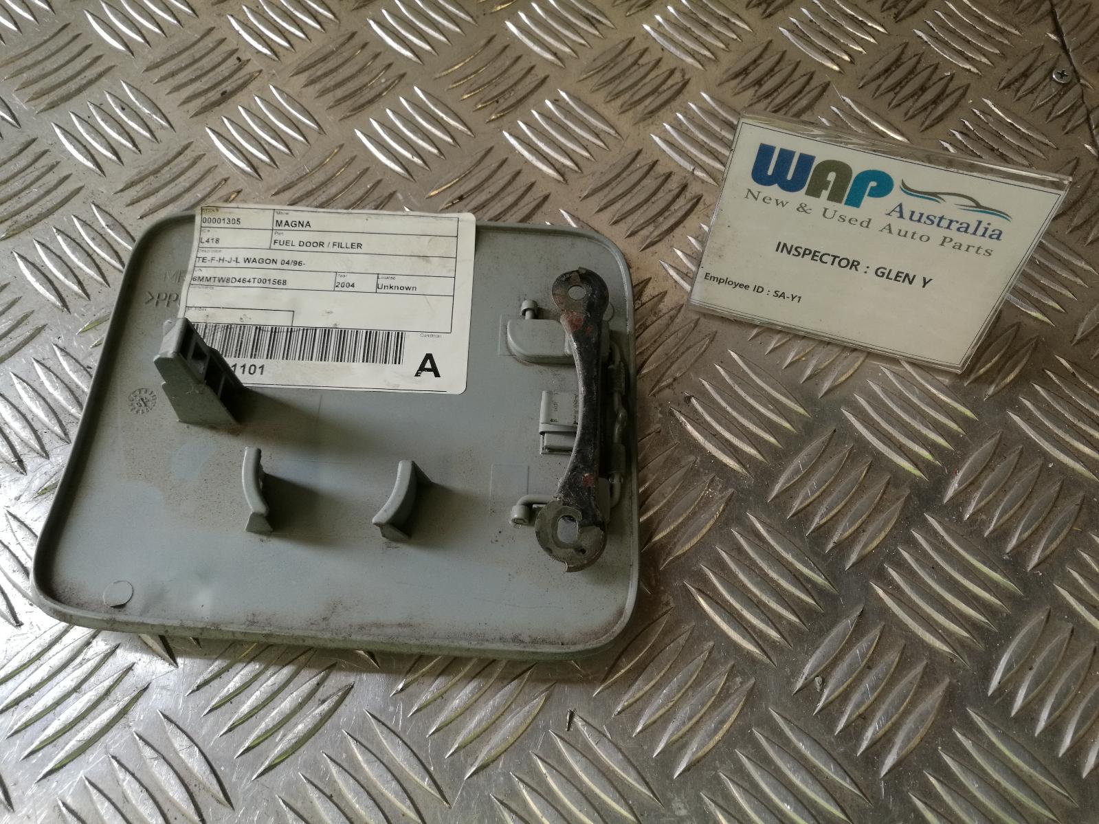 2004 Mitsubishi Magna Fuel Door / Filler View Auto part Fuel Door / Filler Mitsubishi Magna 2004