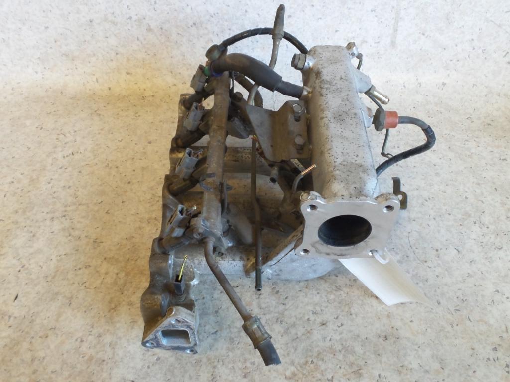 1999 Mitsubishi Mirage Manifold View Auto part Manifold Mitsubishi Mirage 1999
