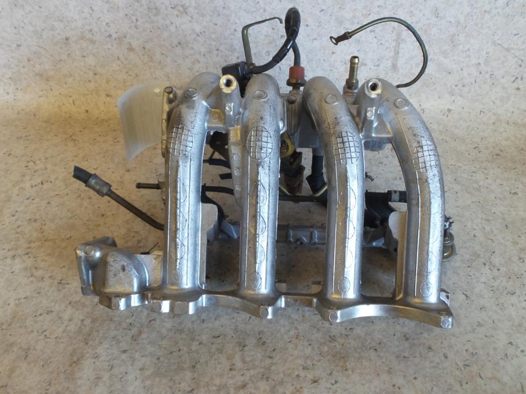 1999 Mitsubishi Mirage Manifold View Auto part Manifold Mitsubishi Mirage 1999