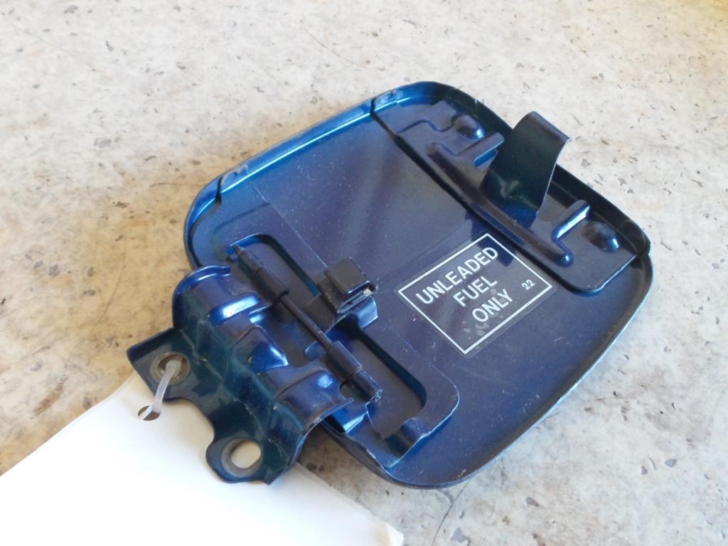 1999 Mitsubishi Mirage Fuel Door / Filler View Auto part Fuel Door / Filler Mitsubishi Mirage 1999
