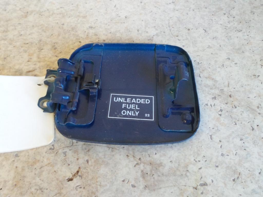 1999 Mitsubishi Mirage Fuel Door / Filler View Auto part Fuel Door / Filler Mitsubishi Mirage 1999