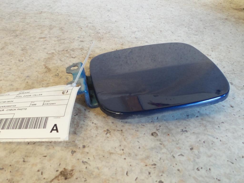 1999 Mitsubishi Mirage Fuel Door / Filler View Auto part Fuel Door / Filler Mitsubishi Mirage 1999