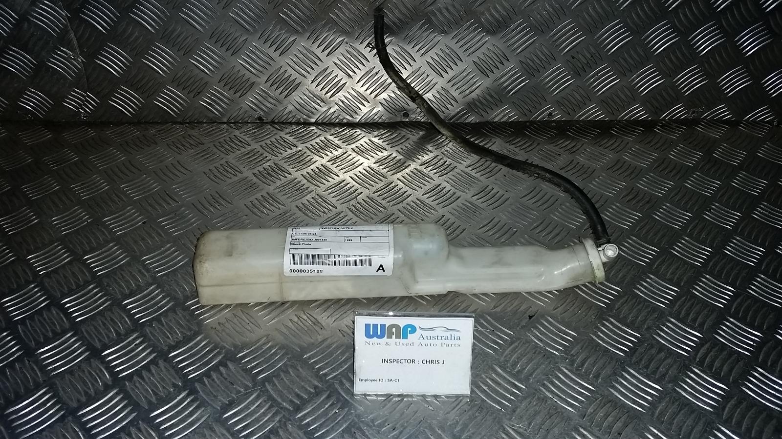 1999 Mitsubishi Lancer Overflow Bottle View Auto part Overflow Bottle Mitsubishi Lancer 1999