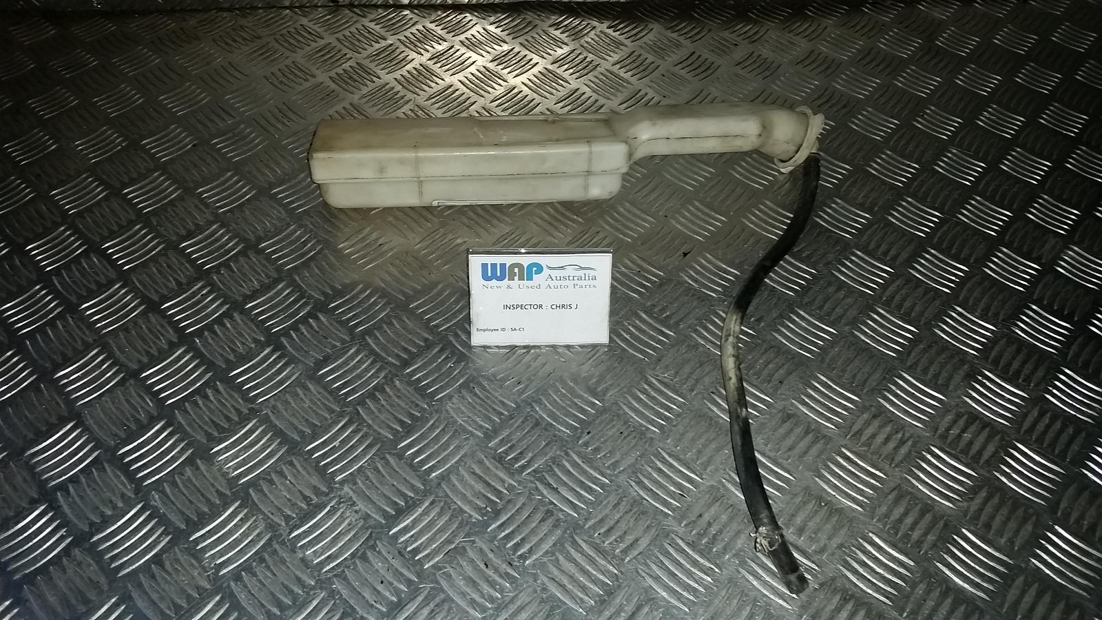 1999 Mitsubishi Lancer Overflow Bottle View Auto part Overflow Bottle Mitsubishi Lancer 1999