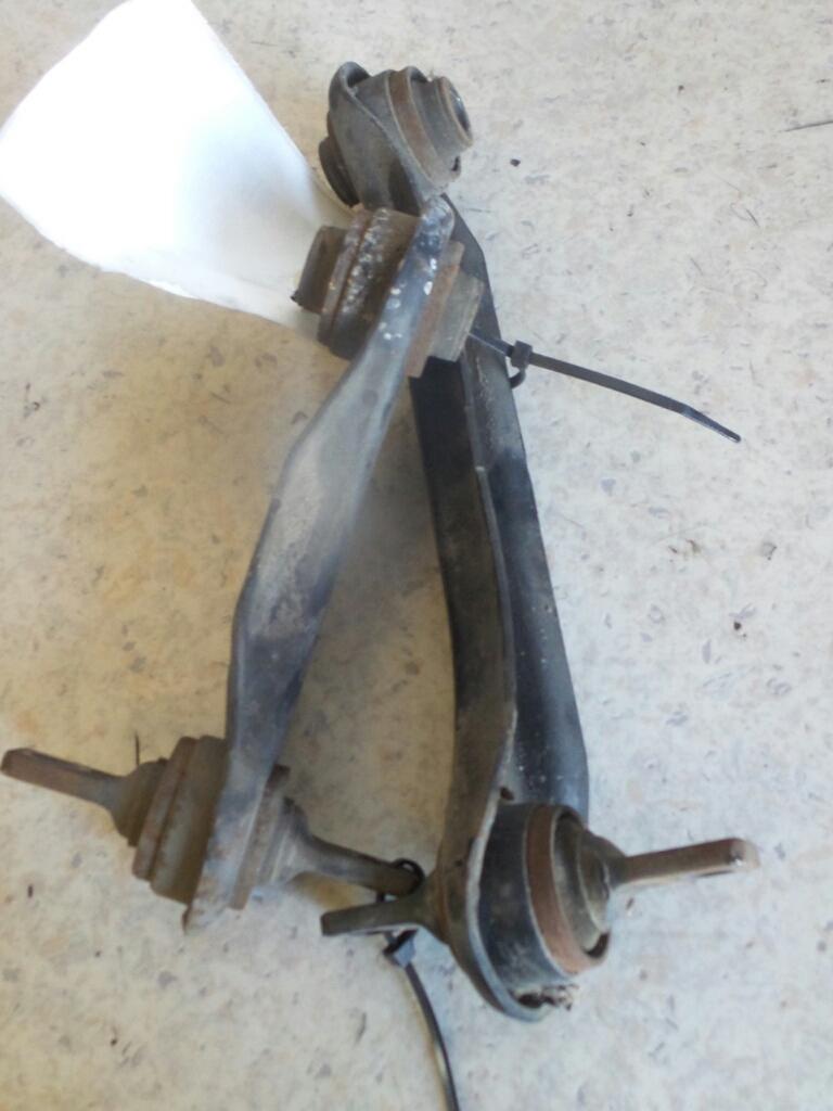 1999 Mitsubishi Lancer Left Rear Trailing Arm View Auto part Left Rear Trailing Arm Mitsubishi Lancer 1999