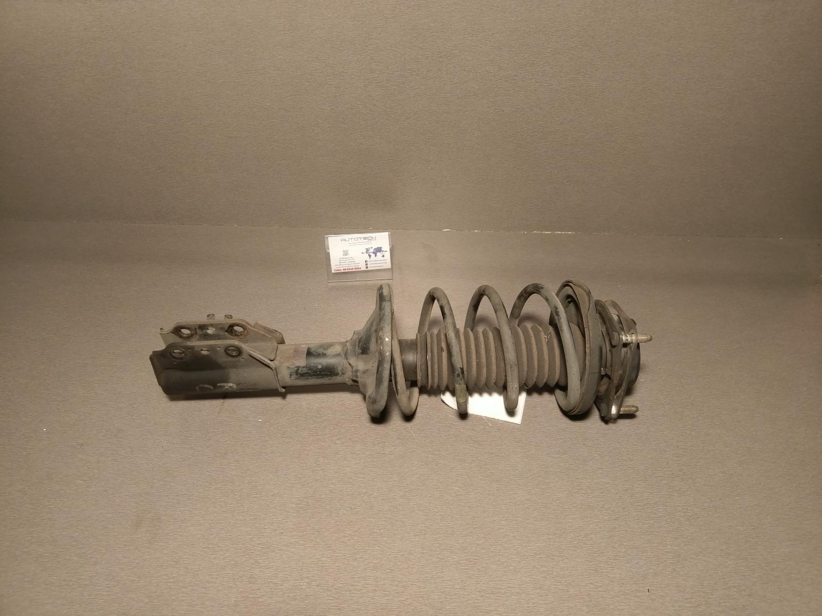 View Auto part Left Front Strut Mazda Astina 1996