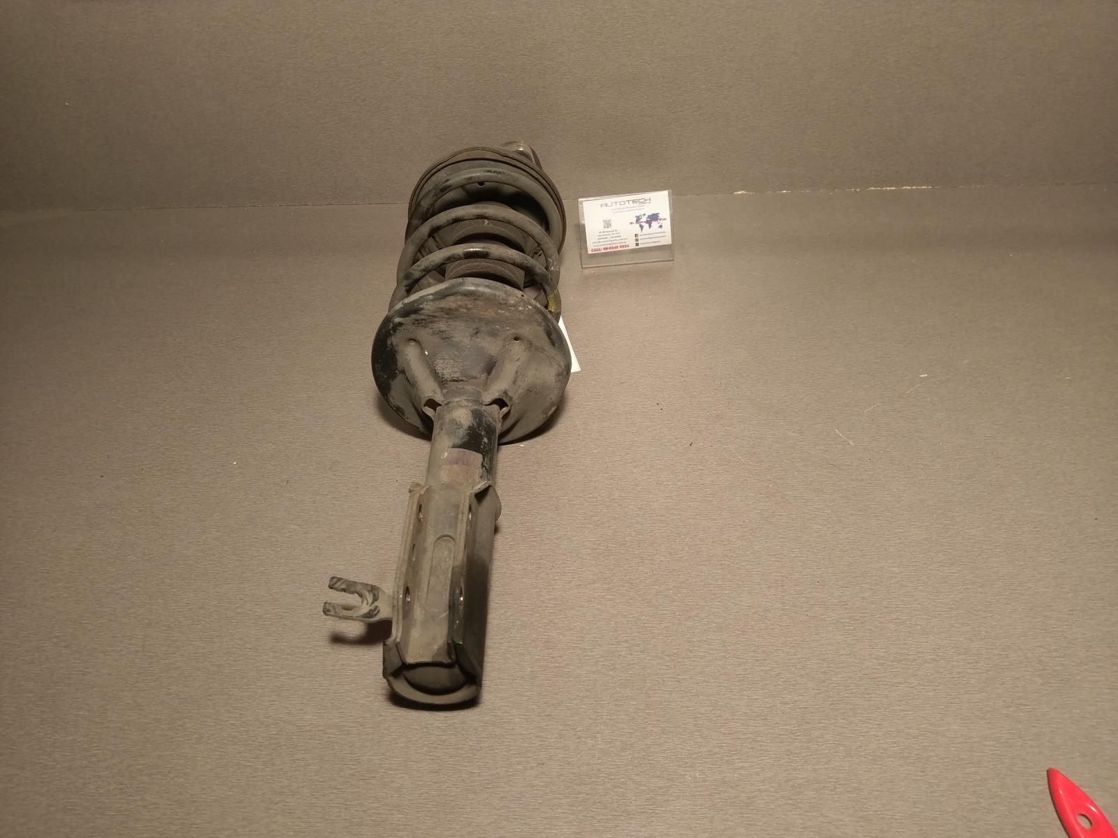 View Auto part Left Front Strut Mazda Astina 1996